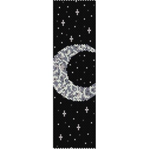 May include: A black and white beaded bracelet with a crescent moon design and white stars on a black background.