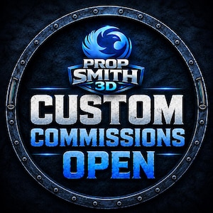 May include: Circular emblem with the text "PROP SMITH 3D" in a stylized, metallic font, above the words "CUSTOM COMMISSIONS OPEN" in bold, white and blue lettering. The design is set against a textured, dark blue background, framed by a riveted metal ring.