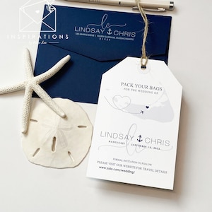 May include: A white luggage tag with blue text that says "Pack Your Bags for the Wedding of Lindsay & Chris Nantucket September 15, 2023". The tag has a map of Nantucket with a heart and airplane on it.