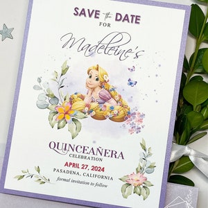 May include: Purple and white save the date card with a floral design and a cartoon image of a princess with long blonde hair. The text reads "Save the Date for Madeleine's Quinceañera Celebration April 27, 2024 Pasadena, California formal invitation to follow".