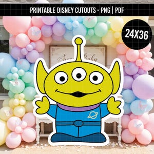 May include: A printable digital cutout of a three-eyed green alien character wearing a blue space suit with a purple collar and a planet emblem on the chest. The character has pointed ears, a wide smile, and is presented as a 24 by 36 inch graphic.