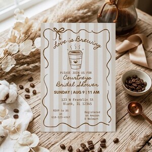 May include: A bridal shower invitation with the text "Love is Brewing" and details for Courtney's Bridal Shower. The invitation is beige with vertical stripes and brown text. Coffee beans and a coffee maker are in the background.