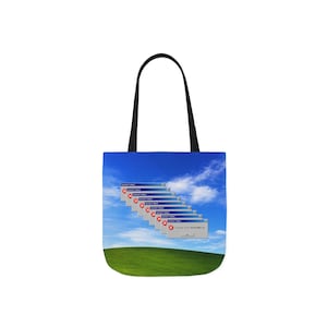 May include: A tote bag with a blue sky and green hill design, featuring a series of Windows error message pop-up windows. The bag has black handles and is designed for carrying items.