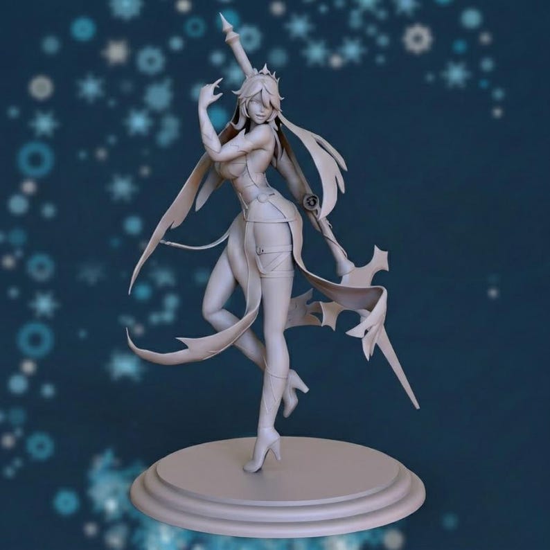 May include: A light gray figurine of a female character in a dynamic pose, holding a stylized weapon. The figure is on a circular base, with flowing hair and detailed clothing. The background is a dark blue with white star-shaped designs.