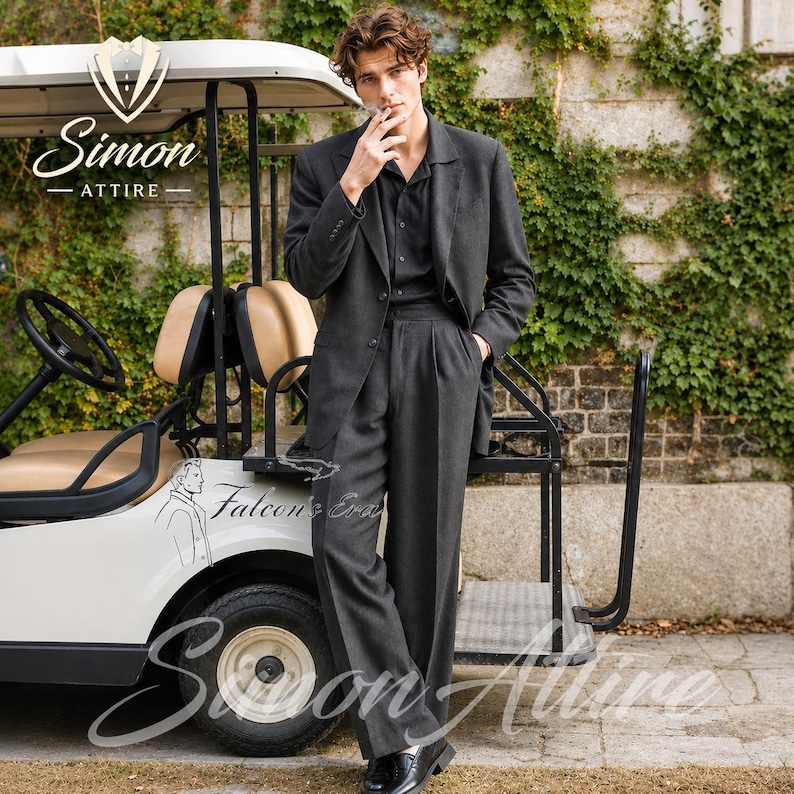 May include: A dark gray suit, including a blazer and pleated trousers, is worn with a black shirt. The image features a golf cart and the text "Simon Attire" and "Falcon's Era". The suit is paired with black dress shoes.