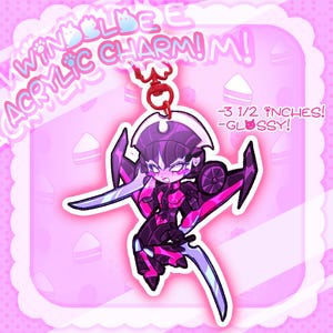 May include: A glossy acrylic charm featuring a character in dark purple and magenta armor with two curved blades. The text reads WINDBLADE ACRYLIC CHARM and 3 1/2 INCHES. The charm includes a red plastic clasp and is set against a light pink background.