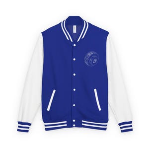 May include: A royal blue varsity jacket with white sleeves, featuring a white striped collar, cuffs, and hem. The jacket has a front button closure and a small white graphic of a mechanical gear on the upper left chest area of the blue torso.