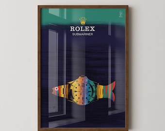 May include: A framed art print showing a Rolex Submariner watch reimagined as a fish. The artwork has a dark blue and green background with the Rolex logo at the top. The watch is rendered in rainbow colours with a striped tail.