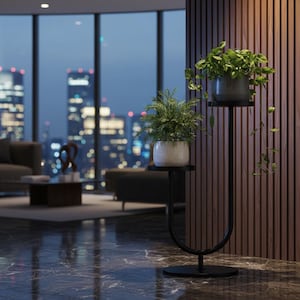 May include: A black metal plant stand with two tiers, each holding a potted plant. The stand has a curved design and is placed in a modern living room with a city view in the background. The plants have green foliage.