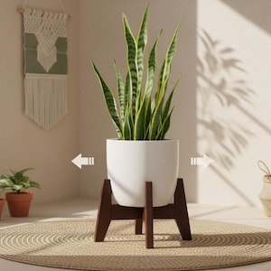 May include: A set of three ceramic mugs with a speckled, matte finish. The mugs are in shades of cream, light gray, and dark gray. Each mug has a simple, minimalist design, perfect for coffee or tea.