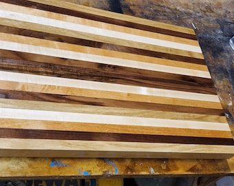 Asst.hardwoods cutting board  1 1/2" thick by 18" wide x 24" long