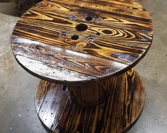 Wooden burnt spool table finished 34"-36"  round