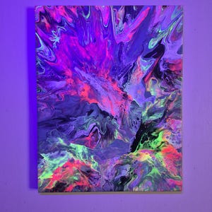 May include: Abstract acrylic painting with a vibrant color palette. The artwork features a mix of neon pink, green, and orange hues against a dark purple and black background. The paint is swirled and layered, creating a dynamic and textured effect.