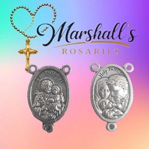 May include: Two oval silver-toned metal rosary centerpieces featuring embossed religious imagery. The left piece depicts St. Joseph holding a child with the text St. Joseph. The right piece shows the Holy Family with the text Holy Family.