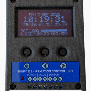 May include: A black rectangular irrigation control unit with a digital display showing date, time, temperature, moisture, and battery levels. The unit features three circular buttons, a blue control panel labeled SUNFY 328, and six screw terminals.