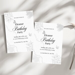 Convite de aniversário floral em preto e branco, design sofisticado.