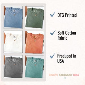 May include: A grid of six solid-color t-shirts in various colors: light blue, olive green, white, orange, gray, and teal. The shirts have a crew neck and a small pendant necklace. Text on the right says "DTG Printed", "Soft Cotton Fabric", and "Produced in USA".