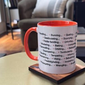 Claude Code Loading Mug | Anthropic AI Fan Gift | Funny Programmer Coffee Cup | Cogitating Pondering Vibing Two Tone Mug