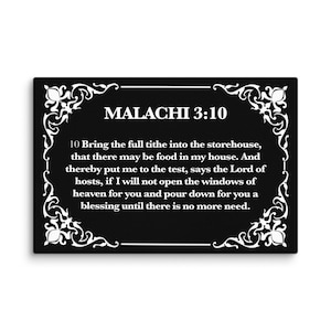 May include: Black rectangular wall art with white decorative floral border and text. The text reads "MALACHI 3:10" and a Bible verse. A decorative piece for home or office.