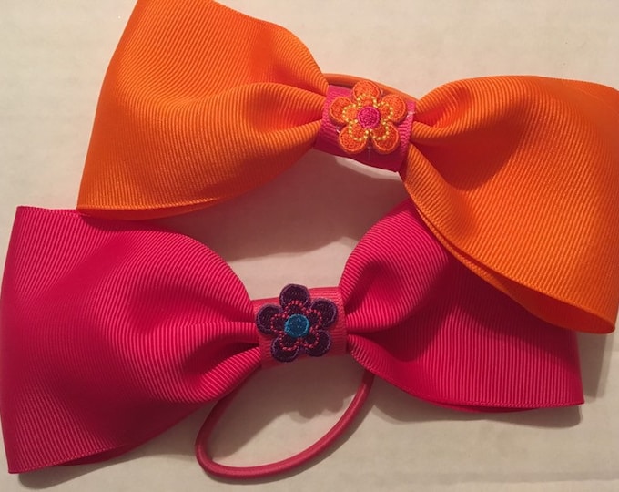 Adorable pink and orange butterfly flower princess cheer and dance bows