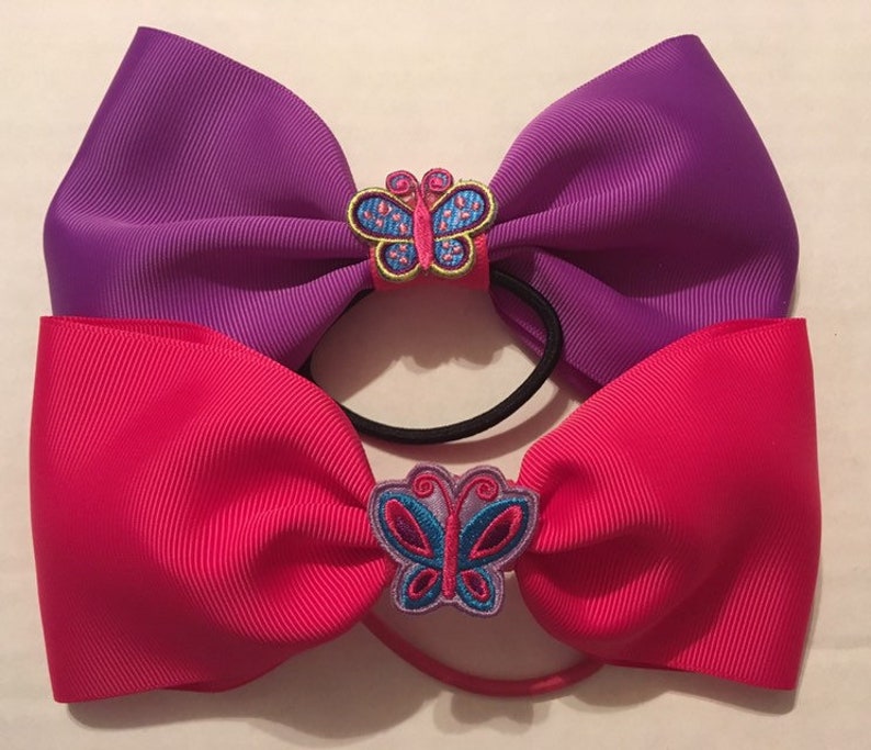 TWO adorable butterfly bows purple and pink image 1