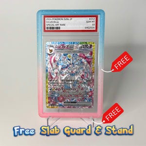 May include: A 2024 Pokemon SV8a JP Sylveon ex #212 Gem Mt 10 trading card in a protective slab. The slab features a blue-to-pink gradient frame with glitter accents. The card displays Japanese text and a holographic illustration of the character.