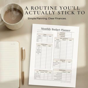 May include: A beige-toned image featuring a cup of coffee, a notepad, a pen, and a printed "Monthly Budget Planner." The planner has sections for income, expenses, and savings goals. Text at the top reads "A ROUTINE YOU'LL ACTUALLY STICK TO."