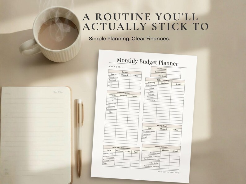 May include: A beige-toned image featuring a cup of coffee, a notepad, a pen, and a printed "Monthly Budget Planner." The planner has sections for income, expenses, and savings goals. Text at the top reads "A ROUTINE YOU'LL ACTUALLY STICK TO."