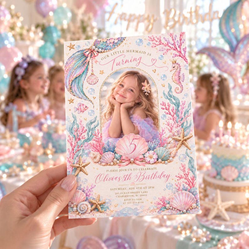 May include: A rectangular birthday invitation card featuring a central photo of a child framed by an arch. The design includes watercolor illustrations of a mermaid tail, seahorse, starfish, seashells, and coral in pastel pink, blue, and gold tones.