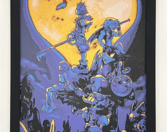 May include: Framed artwork featuring characters from the Kingdom Hearts video game series. The image showcases a heart-shaped background in gold and a dark blue and purple foreground with various characters. The artwork is enclosed in a black frame.
