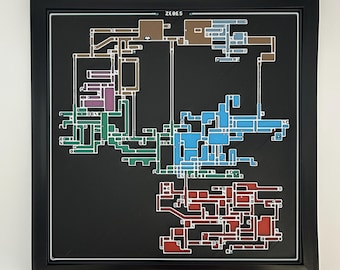 May include: A framed wall art piece featuring a stylized map of Zebes on a black background. The map consists of interconnected geometric sections in shades of brown, purple, green, blue, and red, with the text ZEBES printed at the top center.