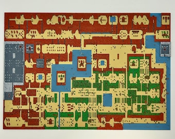 May include: A rectangular wall art piece featuring a multi-layered, top-down 2D map design. The map displays a grid-like landscape with distinct sections in red, beige, green, and blue, representing various terrain types and structures.
