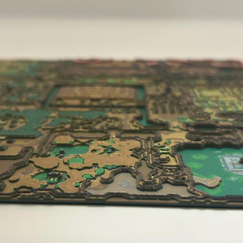 May include: A detailed, three-dimensional map with a layered design. The map features a combination of green, brown, and black colors, with intricate details suggesting terrain and structures. The overall aesthetic is reminiscent of a topographical representation.