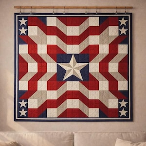 May include: A patriotic quilt with a geometric design in red, white, and blue. The quilt features a central star and star accents in the corners. The quilt is displayed on a wall, adding a touch of Americana to the room.