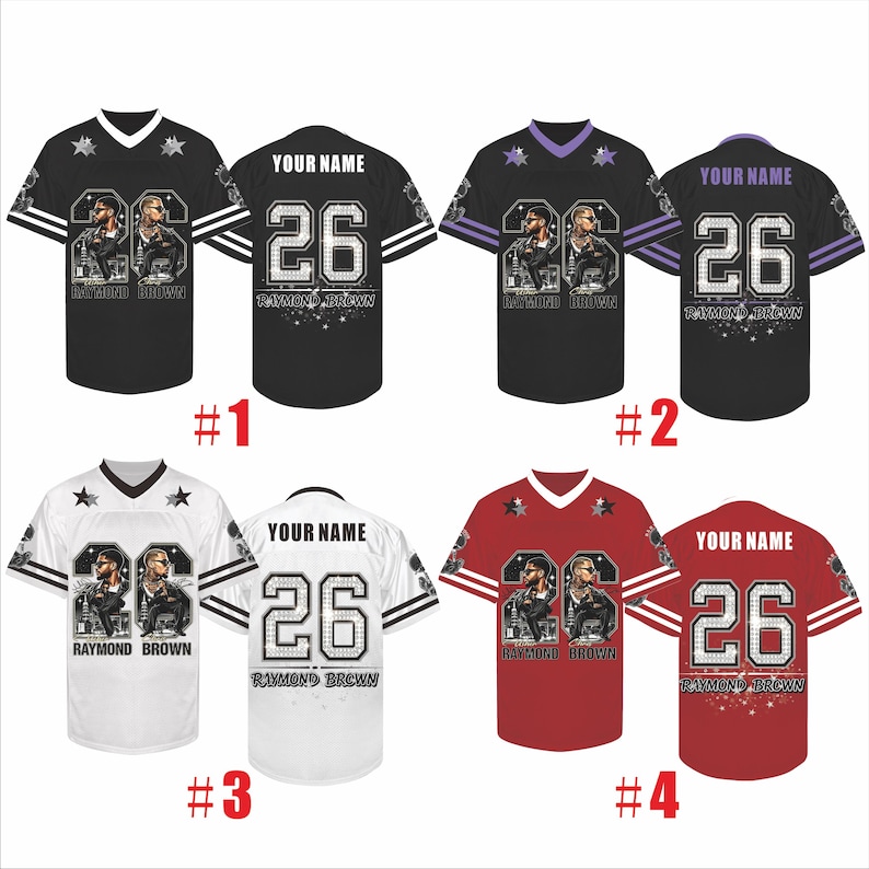 May include: Four short-sleeved sports jerseys in black, purple, white, and red. Each features the number 26, the text RAYMOND BROWN, and a graphic of two figures. The back displays the text YOUR NAME above the number 26 and RAYMOND BROWN.