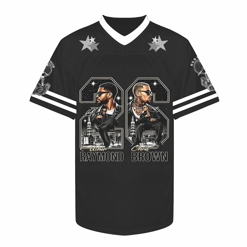 May include: A black V-neck jersey featuring white stripes on the sleeves, two grey stars on the chest, and a graphic print of Usher Raymond and Chris Brown with city skylines. The text reads Usher Raymond and Chris Brown with the number 26.