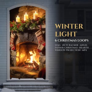 May include: A digital window projection display featuring a stone fireplace with a burning fire, three lit pillar candles, pine greenery, red berries, pinecones, and two hanging stockings. Text reads: WINTER LIGHT 6 CHRISTMAS LOOPS STAG NUTCRACKER ANGEL FATHER CHRISTMAS HEARTH WINDOW PROJECTION MP4.