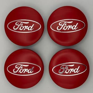 May include: A set of three ceramic nesting bowls in shades of blue, green, and white. The bowls feature a speckled glaze and a simple, modern design. The largest bowl is approximately 6 inches in diameter.