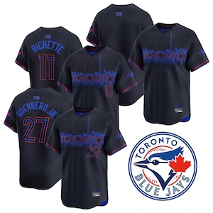 May include: Navy blue baseball jerseys with red and blue detailing. The jerseys display the word "TORONTO" in a skyline design, along with player names and numbers. A Toronto Blue Jays logo is also visible.