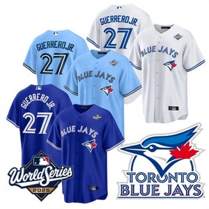 May include: Assortment of Toronto Blue Jays baseball jerseys in various shades of blue and white. Jerseys feature "GUERRERO JR. 27" and "BLUE JAYS" with the team logo. A "World Series 2025" logo is also visible.