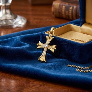 Kruishanger 1 kt rond geslepen diamant 14 kt geelgoud verguld