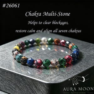 May include: A Chakra Multi-Stone bracelet with a variety of coloured gemstone beads. The beads are faceted and include red, green, blue, and brown. The image text says: "Helps to clear blockages, restore calm and align all seven chakras."