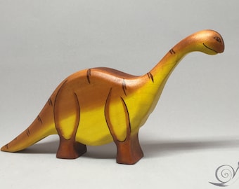 Spielzeug Dino Diplodocus Holz orange braun farbig