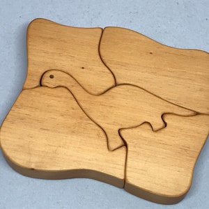 Toy dino wood puzzle natural color
