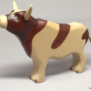 Toy bull brown white colourful head up image 2