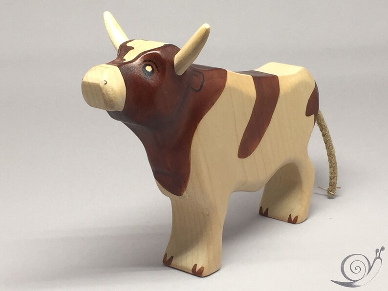 Toy bull brown white colourful head up image 3