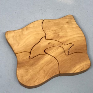 Toy dolphin wood puzzle natural color