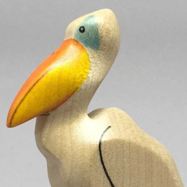 Toy Pelican white yellow standing colourful | Size: 8,5 x 6,0 x 2,4 cm (bxhxs)  approx. 34,0 gr.