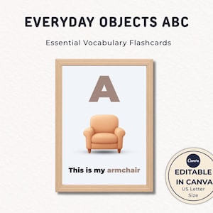 May include: A framed educational flashcard with the text "EVERYDAY OBJECTS ABC" and "Essential Vocabulary Flashcards." The card features a large letter "A" and an illustration of a peach-colored armchair. The text "This is my armchair" is below the image.