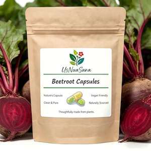 May include: A brown paper bag with a white label displaying the text "Beetroot Capsules." The label also includes the brand name "UsNuaSana" and the phrases "Nature's Capsule," "Clean & Pure," "Vegan Friendly," and "Naturally Sourced." The background features fresh beetroots.